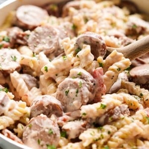 creamy pasta tossed with smoked sausage and tomatoes