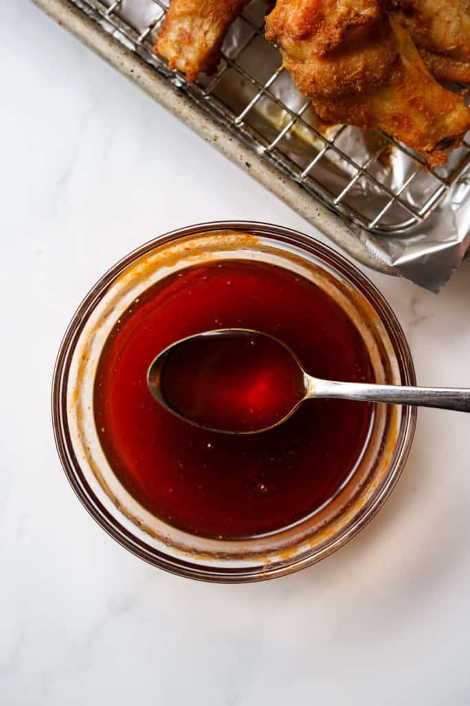 A bowl of hot honey sticky sauce