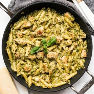 Penne pasta tossed in creamy pesto sauce and chicken pieces