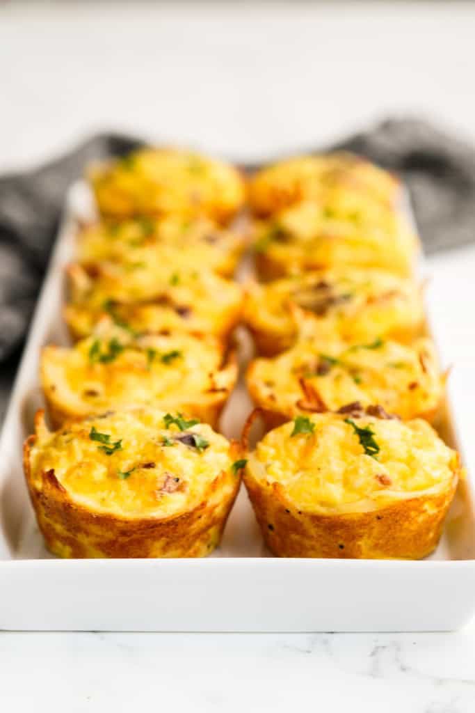 Hashbrown Egg bites lined up on a platter