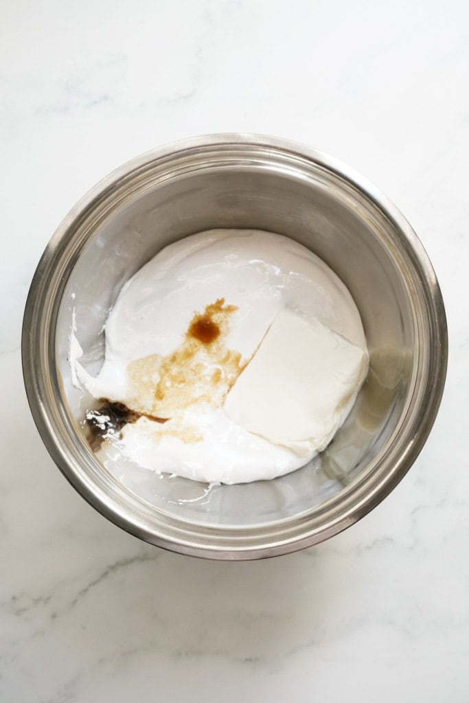 Marshmallow fluff, softened cream cheese and vanilla extract in a mixing bowl